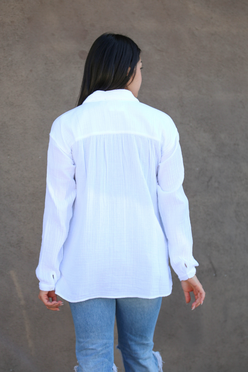 White Long sleeve flowy button-up shirt